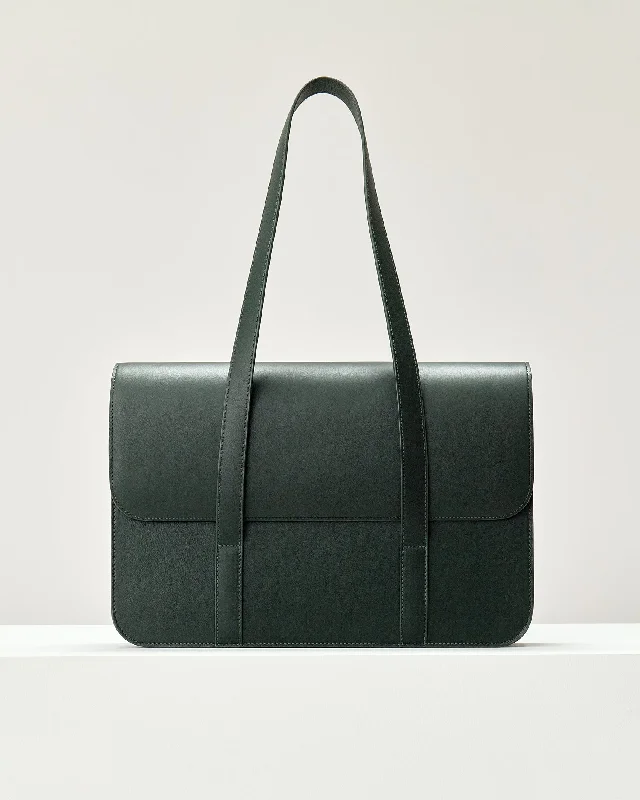 Leather laptop bag with hand-stitched details for a luxury toucheline