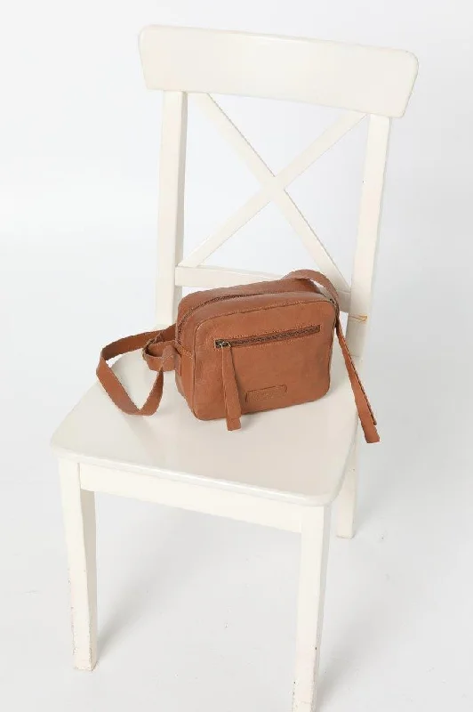 Soft-sided canvas baggage with a retractable handle for flexibilityCosgrove & Co Cross-Body Bag | Carla Tobacco