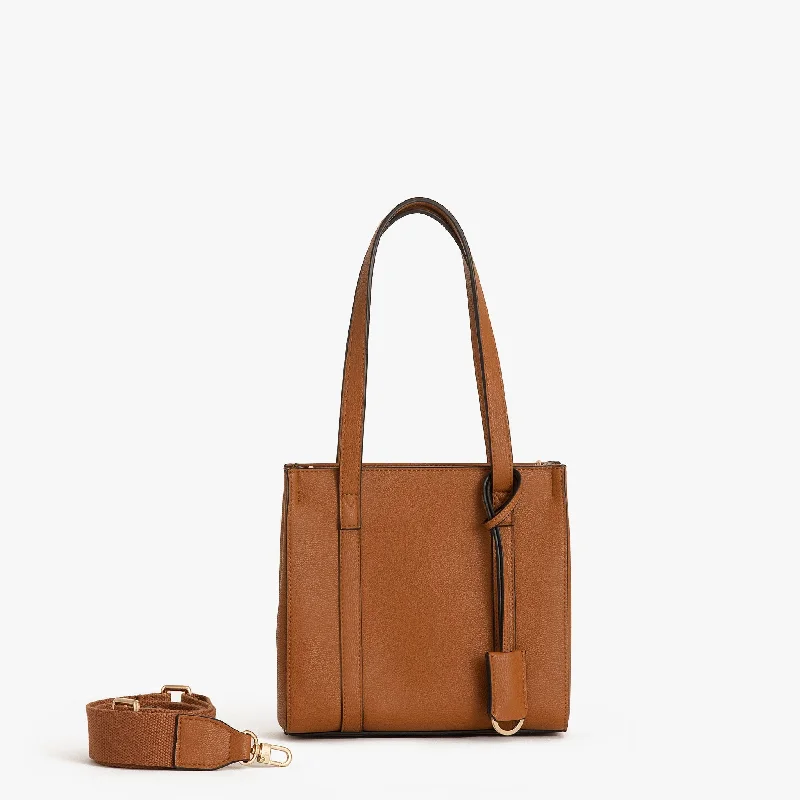 Vintage-style leather baggage with brass hardware for a classic lookHAVEN LABEL | BRONTE MINI TOTE BAG | TAN