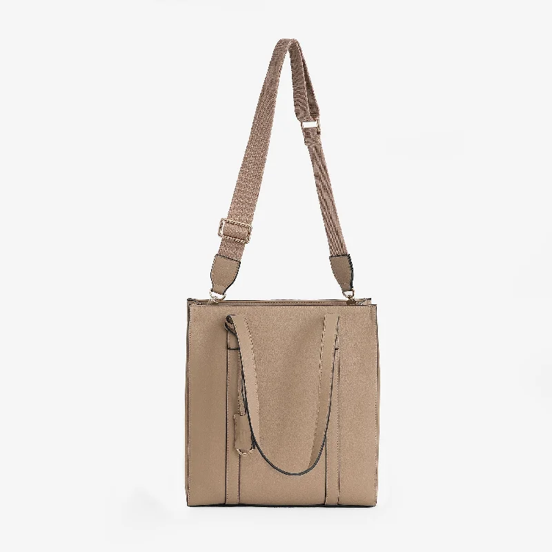 Rolling duffel-style baggage with padded shoulder straps for versatilityHAVEN LABEL | BRONTE TOTE BAG | SAND