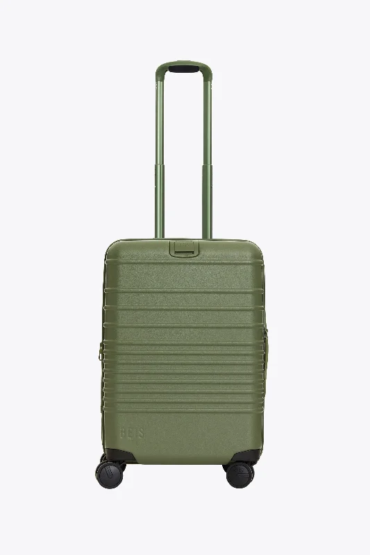 Expandable hard - shell polycarbonate travel bag for long - term international tripsThe Carry-On Roller in Olive