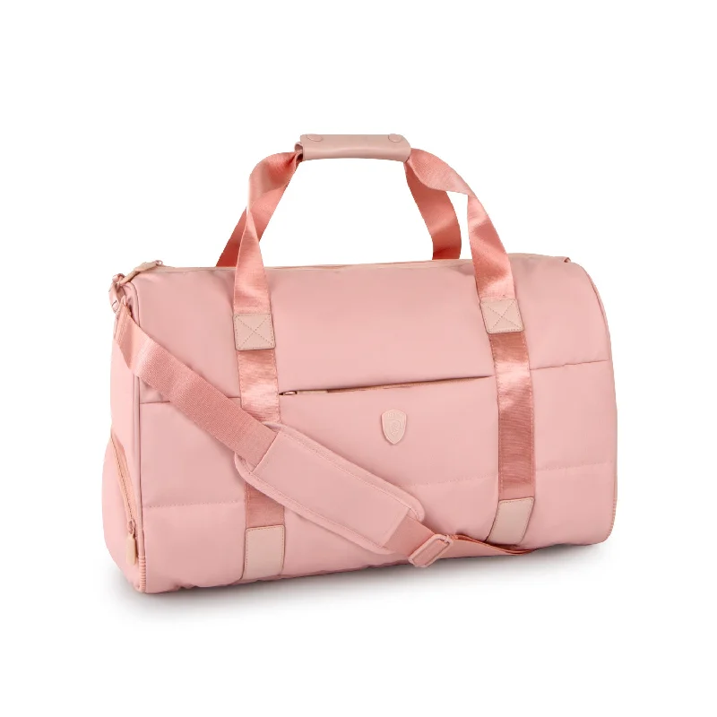 Convertible travel bag that can be used as a backpack or toteThe Puffer Duffel Bag - Rose