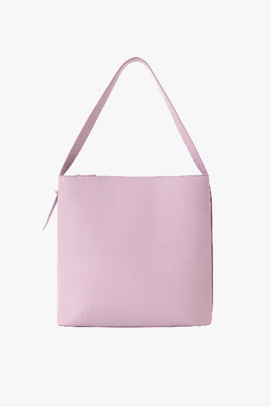 Soft - sided travel bag with reinforced corners for durabilityThe Wicked Tote in Wicked Pink