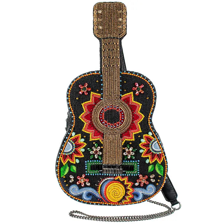 Laser - cut metal coin and key purses with geometric designsMARY FRANCES "Guitar Festival" crossbody handbag