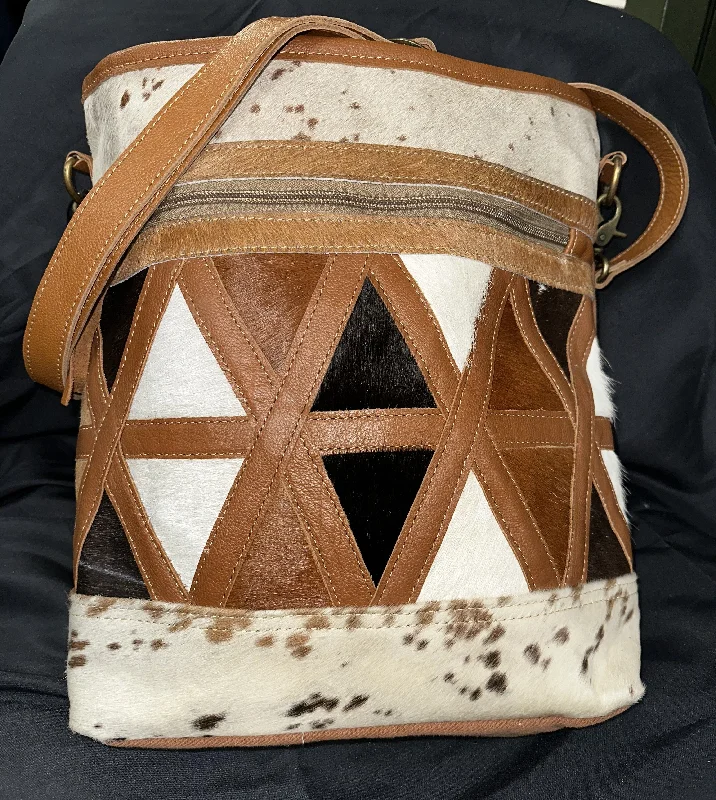 Leather coin and key purses with hand - stitched details for menMyra Bag: "DAKOTA PLAINS CANVAS HAIR-ON BAG"