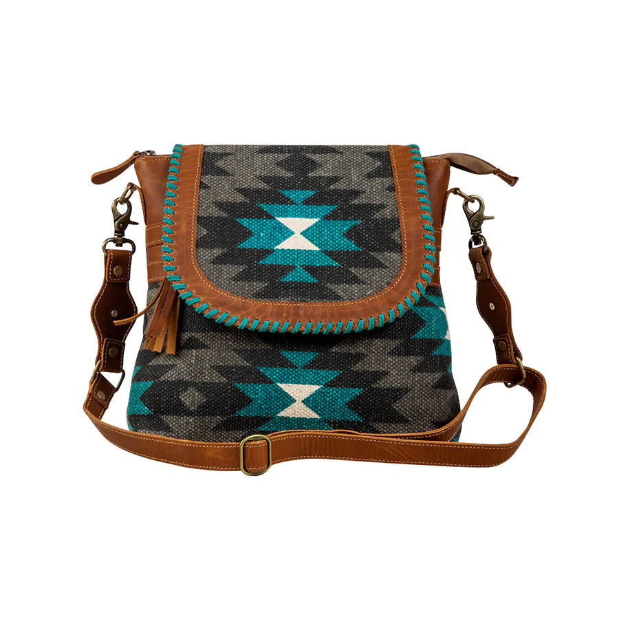 Cowhide leather coin and key purses with a rustic lookMyra Bag: "STARFIRE SHOULDER BAG"