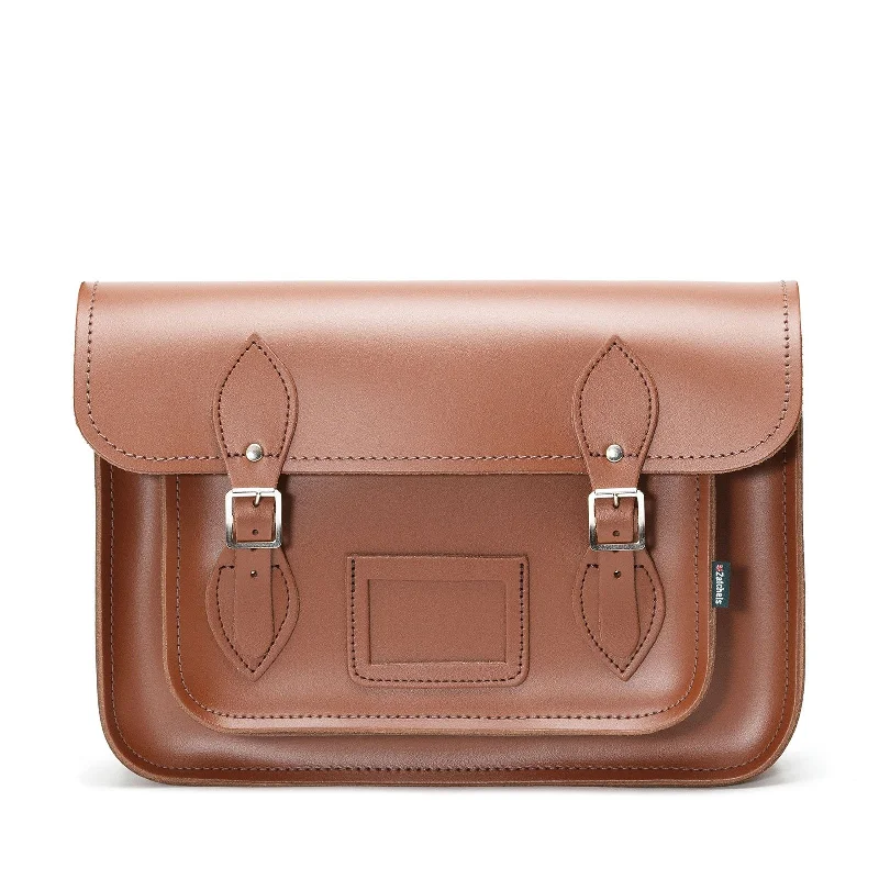 Vintage-inspired satchel with a brass buckle and leather tasselsHandmade Leather Satchel - Chestnut