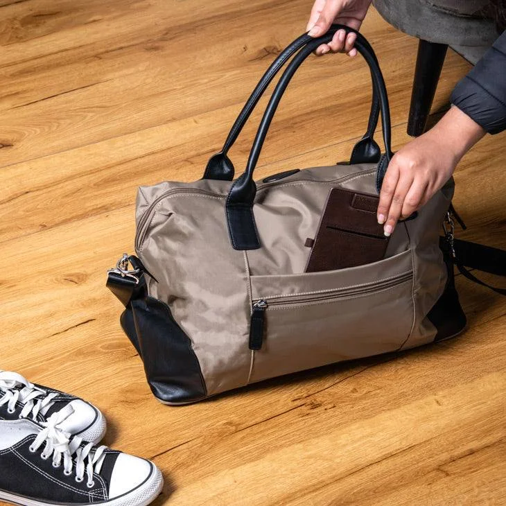 Leather duffel bags with antique brass hardware for a classic and luxurious lookClassic Duffel Bag - Beige