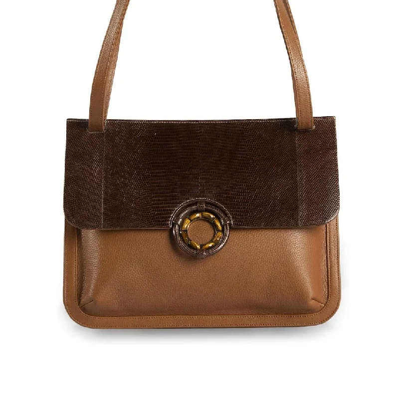 Women's leather satchel with a hand-stitched edge for a premium lookSydney Saddle Bag - Cognac Lizard & Leather, Tiger Eye Grommet