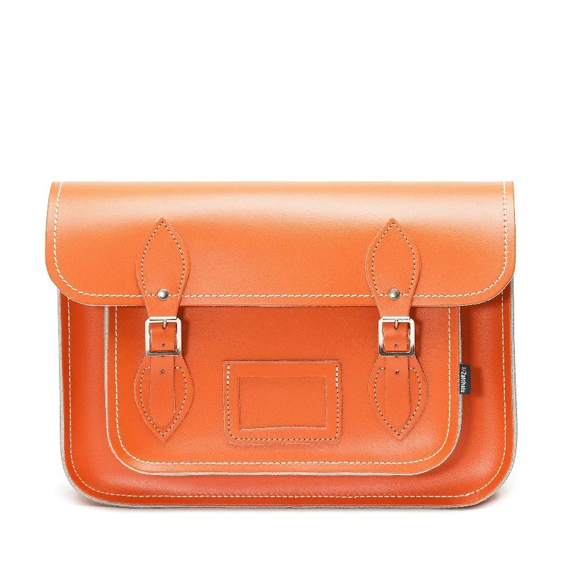 Satchel with a tassel or fringe detail for a bohemian feelHandmade Leather Satchel - Orange