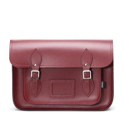 Vintage-inspired satchel with a brass buckle and leather tasselsHandmade Leather Satchel - Oxblood Red