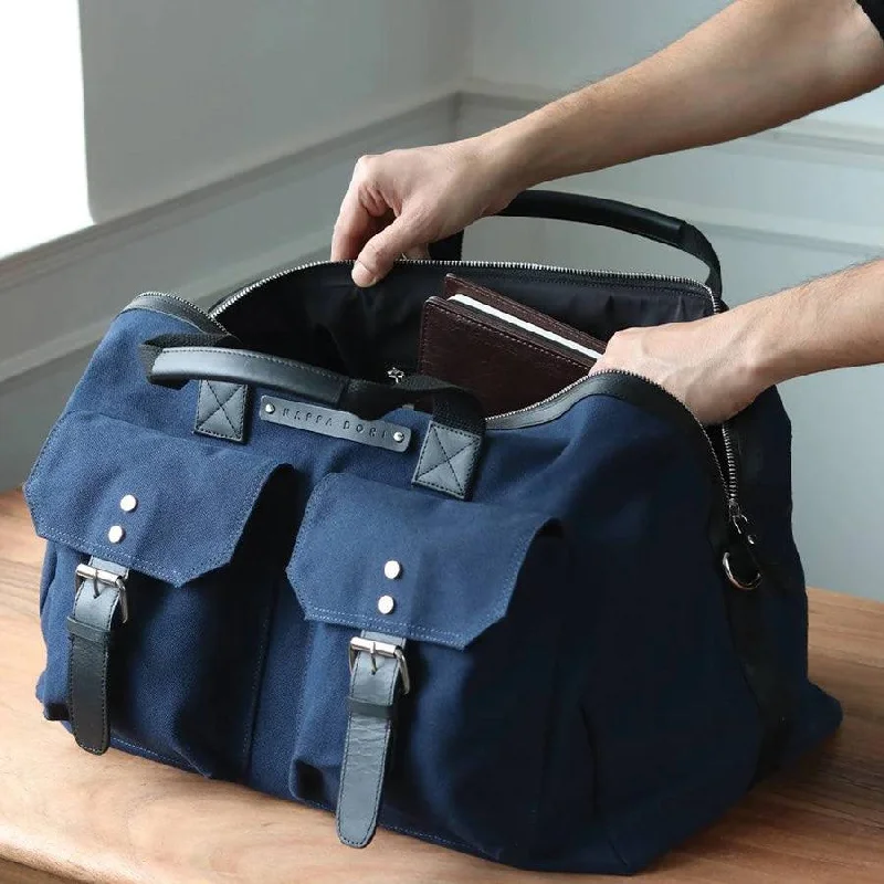 Expandable duffel bags to accommodate more items when neededThe Hitchhiker Duffel Bag - Navy Blue